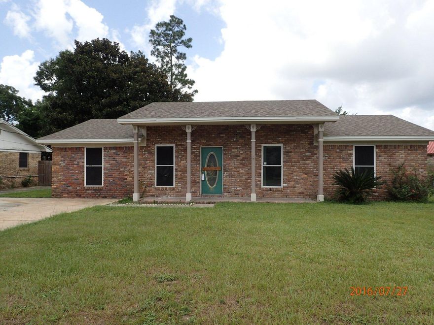 Located just mins from businesses, shopping, and NAS, this all brick 3 bedroom 2 bath REO property is one to see. Just over 1500sf, this home seen many updates including newer roof, HVAC unit, tiled floors and vinyl windows. Still some work required but you will be very surprised as to what it will get to get property into move in condition! Priced aggressively to sell, this property is a must see for both investors, and owner occupants. Though, this property may not qualify for all types of financing, don't let this one pass you by. Call today before it is gone.