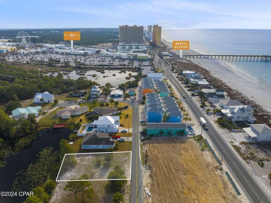 MOTIVATED SELLER! SHOW AND BRING AN OFFER. OWNER FINANCING AVAILABLE. Short term rentals not allowed.Rare LAKEFRONT lot with GULF VIEWS. Palm Lake is renowned for its close proximity to the Gulf of Mexico and Palm Lake frontage. LOCATION-LOCATION-LOCATION! This prime LAKEFRONT lot is just a few steps to the beach and Pier Park. This lot is the perfect lot to build the 3 story vacation home that you have been dreaming of. Premier market location just steps from the shopping, dining, and entertainment at Pier Park, fishing and fireworks on the Russell Fields Pier, concerts in Aaron Bessant Park, and beach accesses 61 and 62 to the sugar white sands and sparkling Gulf of Mexico.There is a picture provided of a 'To Be Built Home' on a similar sized lot. So close to the beach and Pier Park, you won't even need a golf cart. Gulf and Pier Park views possible. No HOA fees. 13 miles gate to door from Northwest Florida Beaches Airport.