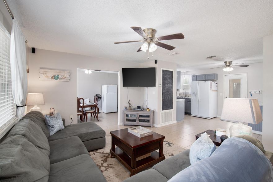 Back on Market at no fault to the seller! LOCATION! Beautiful home features 3 bedrooms, 2 bathrooms, with a large fenced in backyard!! BRAND NEW ROOF March 2022. New water heater 2020. Spacious living room adjacent to the converted garage space that can be used as a dining room, play room, another living room, or whatever you choose! The galley kitchen offers plenty of counter space, with an additional coffee bar. Also features a screened in back porch and a large fire pit to enjoy the Florida evenings. Did I mention the large fenced in yard?! Perfectly located between Eglin AFB and Hurlburt Field; plus close to all the shopping and dining that FWB has to offer!