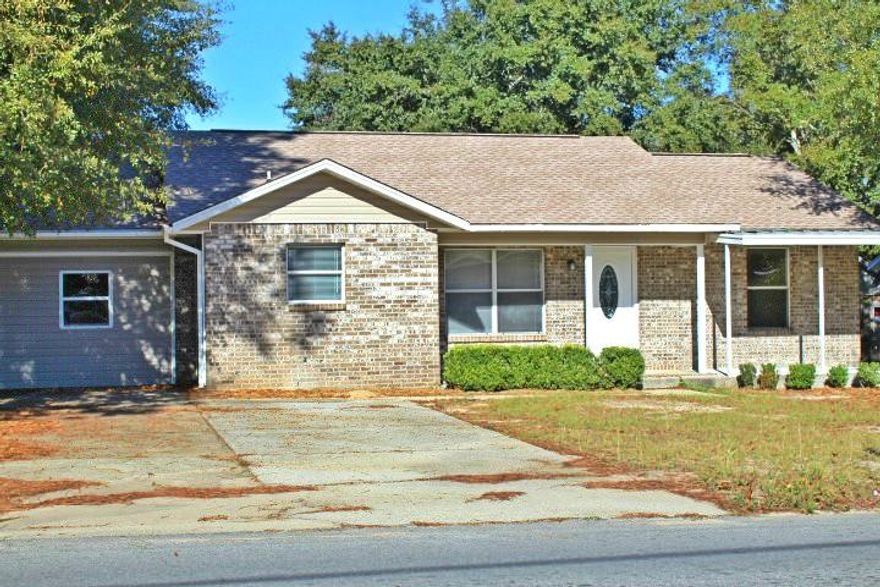 Completely renovated four bedroom, two bathroom home that is conveniently located South of I-10. Almost everything is new but without the new price! As you drive up, you will notice the brand new roof that is sure to help with insurance costs! When you enter the home, you will take in the open floor plan with new flooring throughout. The kitchen has beautiful cabinets that are stunning and match perfectly to the gorgeous granite counter tops. The master bathroom has an en suite bathroom that is completely new from the upgraded shower to the vanity! The master has it's own exit to a screened in porch. There are two other bedrooms near by with a full bathroom.