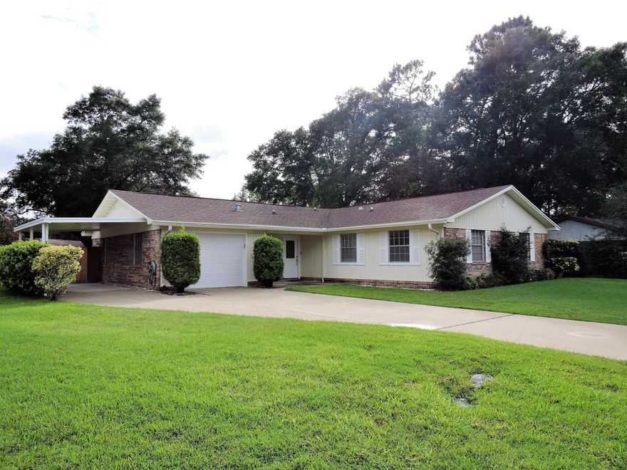 Great LOCATION!!! Beautiful, well maintained home right down the street from the Niceville A+ Schools & a very short drive to Eglin, Duke, & Hurlburt! 3 spacious bedrooms. Master bedroom w/ en-suite bath w/ tub/shower combo. Spacious family room, Flex Space, and kitchen. Nicely laid out and great flow. Tons of storage! Inside laundry and a SUPER deep garage, newer garage door and opener. Additional car port on the side with a double gate to back yard. Home is on a quiet cul de sac in Palm Estates with no through traffic, large, FENCED, lush yard, and a great covered patio. Additional shed in side yard for storing your lawnmower, bikes, and tools! Newer HVAC 2008, Roof 2006, water heater 2004. Short hop across the bridge to the beautiful Destin sugar white sand beaches and great restaura