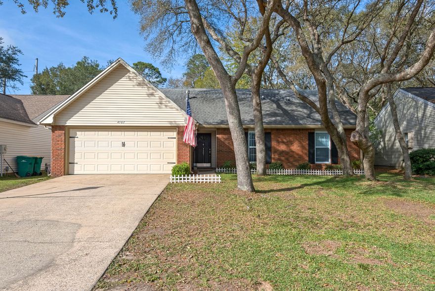 Exceptional LOCATION and Extra LARGE LOT right in the heart of Bluewater Bay! Welcome to 4507 Parkwood Lane - located directly across the street from Bluewater Elementary (gate in backyard fence to access walking path to school) and within walking distance to local grocery store and shops, this home features 4 bedrooms and 3 full baths! Over 1900sqft of space to include a central living space with faulted ceiling and gas fireplace, dining space off of an updated kitchen, 3 bedrooms and 2 baths downstairs, and 1 bed and 1 bath upstairs. The updated kitchen includes gorgeous black stainless steal appliances, granite counters, white cabinets, center island with hanging pot rack, updated hardware, and updated sink faucet. The baths include tile floors, painted cabinets, and updated hardware