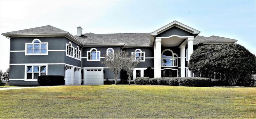 Exquisite Blackwater Bay Waterfront 5 bedroom, 7 bath home located in desirable Casa Grande Estates. The soaring ceilings and floor to wall windows showcase magnificent views of the Bay. Two docks and a floating boat lift afford quick access to the Bay. An elevator adds to the ease of living in this two story home. Kitchen features stainless appliances, two ASKO dishwashers, double Dacor convection ovens, a 3rd oven, gas range, Viking professional range hood, double warming drawers, microwave, Sub-Zero Refrigerator and Freezer, Custom cherry cabinetry, granite counter tops and large walk-in pantry. Eleven leather recliners in home theater makes this home a place you never want to leave! Gas and wood fireplaces add a cozy feel to this luxury home. See Feature Sheet for list of amenities