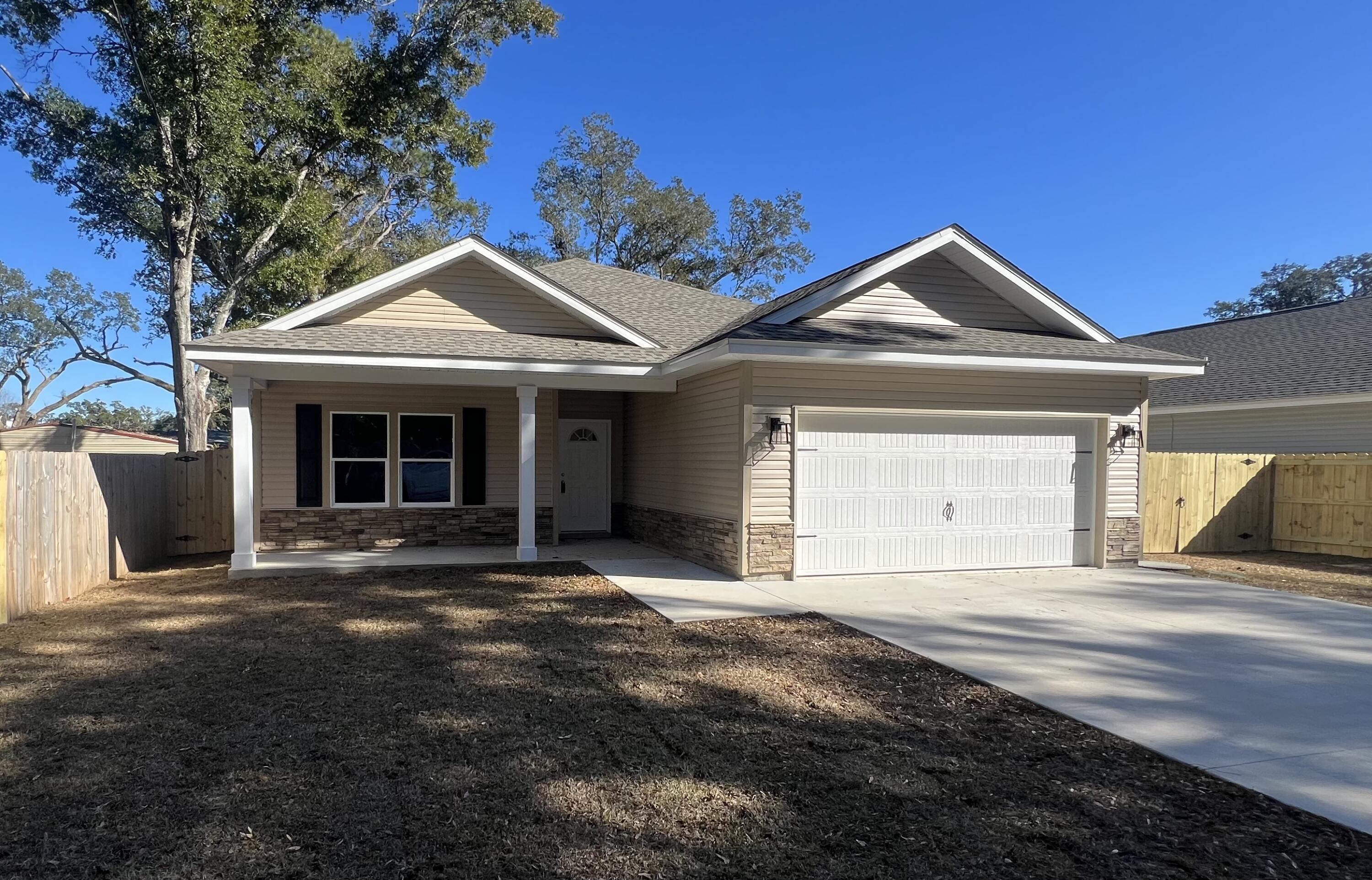 New Construction - One of 3 homes tucked away on private drive. Seller offering up to $5K in closing cost or rate buy down with acceptable offer. Homeowner insurance estimate under $1,800 a year! Home has beautiful finishing touches including LVP flooring throughout, nine-foot ceilings with a tray in the master and living area. Open kitchen with custom white shaker style cabinets with easy close doors, granite counter-tops, stainless steel LG appliances including refrigerator. The dining room leads to the covered back porch grilling area. Both bathrooms have granite countertops and master has large walk-in closet. This is a Good Sense energy efficient home with Low E windows and Rheem HVAC. Home includes privacy fence with gates on both sides. Well water irrigation system.