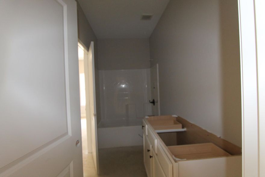 Welcome to Vieux Carre', a premier new 12 lot development featuring Craftsman style homes with a Louisiana flair. Homes feature slurried brick, hardy board siding, copper lanterns, etc. As you enter the front of this 4/3 home through the large covered porch with 8 Ft. solid wood stained front door, bedrooms 1 and 2 are on your right. The gourmet kitchen boasts custom White painted cabinetry with crown moulding, 3 CM. granite countertops, Frigidaire Gallery series stainless appliances (including a commercial grade refrigerator/ freezer), and roomy breakfast bar.