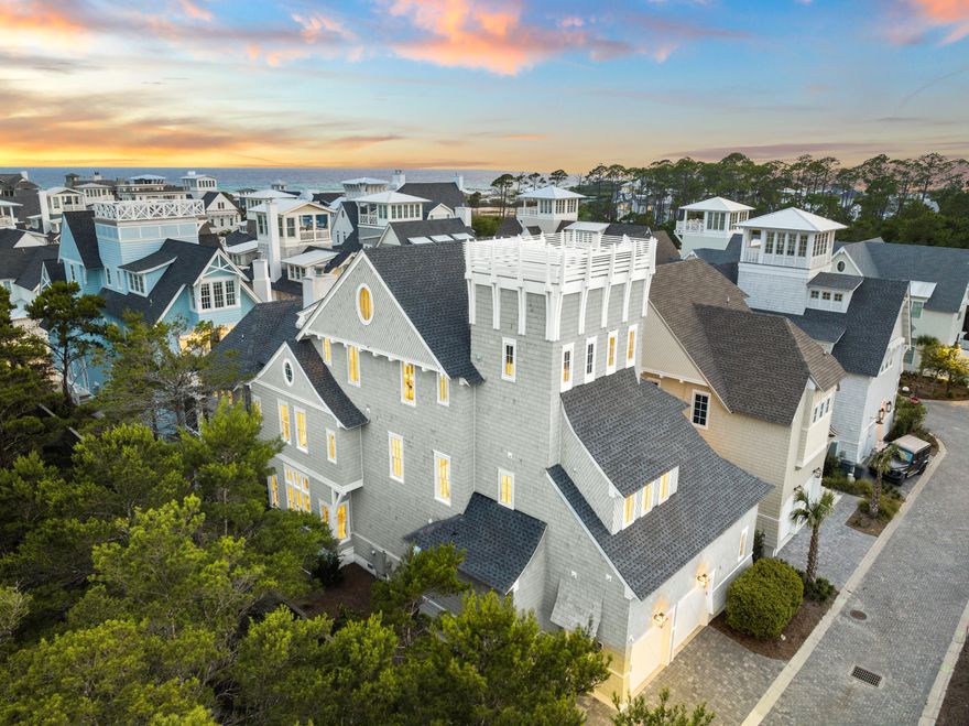 Tucked behind the private gates of the highly sought-after Grace Point community along iconic 30A, 28 Rainer Lane is a masterfully designed residence offering timeless architecture, expansive living space, and refined finishes. Framed by lush native vegetation and glimpses of the Gulf, this designer-furnished home stands as a testament to elevated coastal living. Designed by acclaimed architect R.W. Lowe and brought to life by the team at Pointe Construction, the home spans over 5,200 square feet across four thoughtfully curated levels.From the moment of arrival, guests are welcomed by the soothing sound of the private pool's cascading water feature and a gracious front porch that sets the tone for the tranquil experience within. Venetian plaster walls, reclaimed beams, and artisan detailing define the main living and dining areas, which flow seamlessly into a professionally outfitted Chef's kitchen. Custom cabinetry by Kay Fuller & Sons is paired with a Wolf range, Sub-Zero refrigeration, quartz countertops, and a striking full-wall pantry complete with a rolling platform ladderoffering both drama and utility.

Designed for indoor-outdoor living, the bi-fold doors open to a private courtyard oasis with sun loungers, gathering space, and a fully equipped summer kitchen. A guest suite with ensuite bath, powder room, home office, laundry, and an oversized two-car garage complete the first level. A full-service elevator and a stunning stairwell with reclaimed treads and shiplap walls provide elegant access to the upper floors.

The second floor hosts a comfortable den with wet bar and covered porch, as well as four beautifully appointed bedroom suites. A secondary laundry hookup is also available for convenience. The third level is dedicated entirely to the sun-drenched primary suite, featuring soaring vaulted ceilings with wood beam accents, dual walk-in closets, and a spa-inspired ensuite with Carrera marble wet room, soaking tub, double vanity, and enclosed water closet.

At the top, a fourth-floor viewing deck offers panoramic views of the Gulf and the surrounding community, perfect for taking in Emerald Coast sunsets. A dedicated wet bar and half bath enhance the functionality of this breathtaking retreat.

As Grace Point continues to evolve, the construction progress at the front of the neighborhood is enhancing both the community aesthetic and buyer interest. The upcoming mixed-use addition will offer future conveniences like a local coffee shop, fine dining, and green spaceadding to the sense of vibrancy and connection that makes this location so special.

Grace Point residents also enjoy access to the WaterSound Club, including its private beach club, championship golf, tennis and pickleball courts, a state-of-the-art wellness center, and the new Camp Creek amenities. The community's private gate to the adjoining beach club ensures seamless beach access to the sugar-white sands.

Grace Point's central location places it just moments from Alys Beach, Rosemary Beach, and the best dining, shopping, and lifestyle destinations 30A has to offer. Inquire today to schedule your private viewing of this exceptional property and experience the next chapter of luxury coastal living.