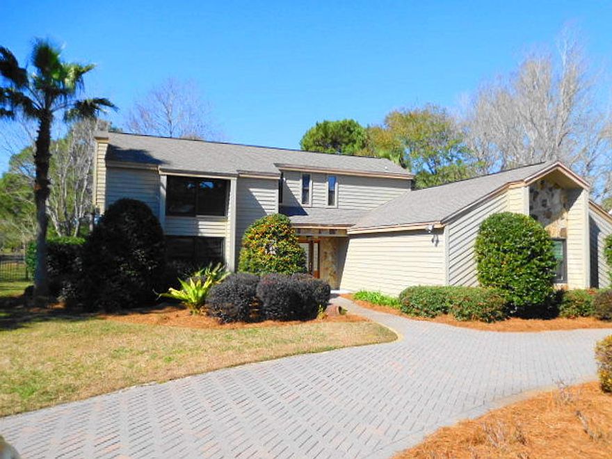 Price reduced to sell! This beautiful large, updated home on the golf course is a must see located in Indian Bayou. This home is decorated and ready to show with it's granite counter tops, appliances, brand new back deck and a stylish black fence outlining and enclosing the back yard. The Florida Room has a beautiful view of the Seminole Golf Course located near the #8 tee box. The landscaped yard has a brick paved half-circle driveway joining the two car garage. Buyer to verify all dimensions. Furnishings are negotiable.