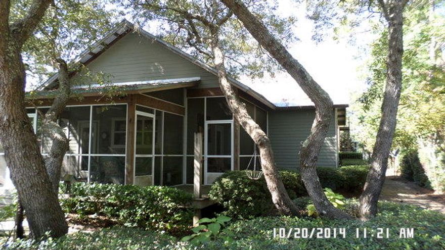 In the heart of Mirimar Beach, San Destin, and Santa Rosa beach, this 1662SF is minutes away from San Destin Nightlife, beaches, hospitals, shopping and so very much more. Situated on a corner lot, the home has hardi siding, a metal roof, screened porch and detached garage. Above the garage are the additional living quarters for guests and in laws. Home has all tile in the main home, open floorplan with living room, kitchen and dining area all within view of the fireplace. Master and additional bedrooms are hear as well as a loft area. A fantastic home in fantastic condition!