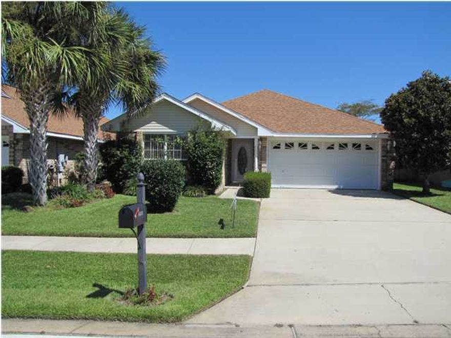 3BR/2BA all brick home for rent in Sunsail! Fresh Paint & NEW Carpet in bedrooms! Great location close to the beach as well as the shopping and restaurants at Destin Commons! 2 car garage. Nicely landscaped. Refrigerator, washer and dryer stay! Split bedroom plan with high ceilings and open spaces! Upgrades include corian counters, a covered and tiled patio, and glass storm doors. Close to all Destin activities, military bases, and airport. Yard maintenance included in price. All dimensions are estimated and should be verified if important. Great price for a great home at the beach in Destin! Call for your private showing today!