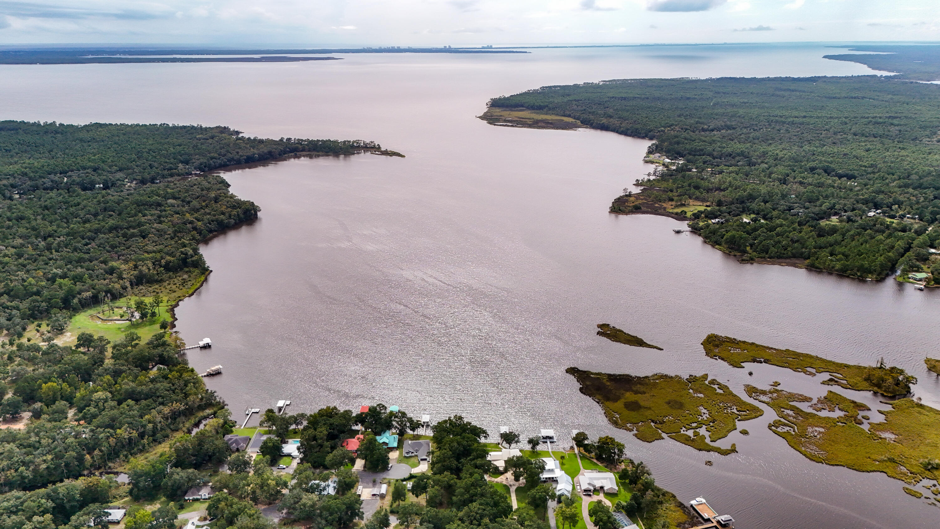 Rare,Rare,Rare !!!!! Looking somewhere special to build your dream waterfront home? Look no further. Over a half acre of high and dry waterfront property with a 100ft on the deep water of alaqua bayou facing west sure to dazzle you with amazing sunsets! The bayou gives you direct access to the Choctawhatchee Bay and some world-renowned fishing! Great location too in the growing town of Freeport and just minutes from Midbay bridge, shopping, and the world's most beautiful beaches!  Don't miss this one!