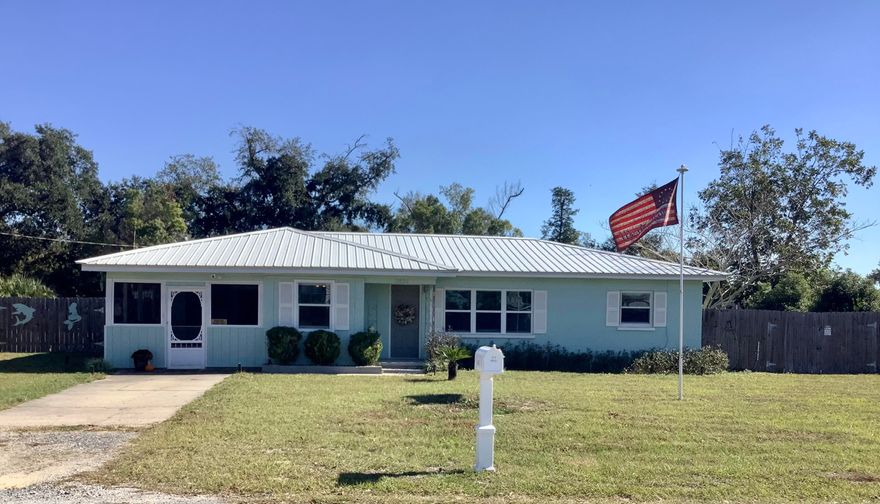 Step into comfort with this delightful 3-bedroom, 2-bathroom single-family home Embrace the warmth of 1510 sq ft of living space this residence exudes character and charm. A dedicated storage/workshop with power offers endless possibilities, from crafting to storing your outdoor gear. The expansive fenced yard ensures both security and privacy, making it an ideal space for gatherings or a peaceful escape. Entertain effortlessly on your large screened-in patio, where the Florida breeze meets the comfort of home. Convenience meets lifestyle with this home's proximity to schools and major shopping centers, ensuring that everything you need is within reach. And when it's time to unwind, take a short drive to the sugary white sands of both Panama City and Panama City Beach.