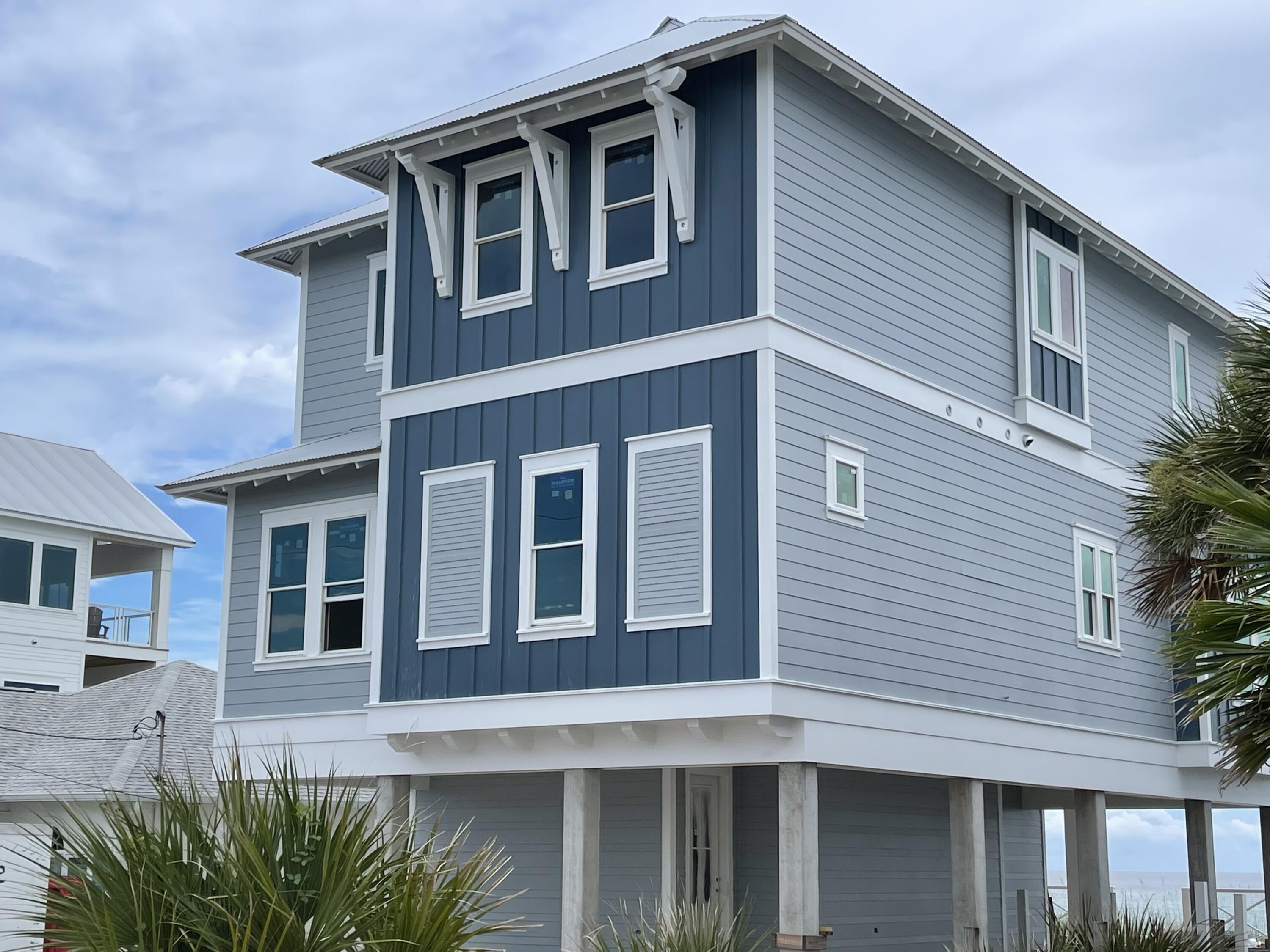 STILL UNDER CONSTRUCTION, Fully Furnished, Professionally Decorated TO BE COMPLETED 9/15 This Beach House is within walking distance to Pier Park and just across the Street from Very Popular Dusty's Raw Bar.  The House sleeps 20 and is ready to go.  This Three Story, 6 Bedroom, 6 Full Bath home is built on a 50' x 124' Gulf Front lot with your own private Beach walkover, private pool and plenty of deck room on each floor.  The house features two master suites that are Gulf side.  ON RENTAL, SHOWING ON FLIP EACH SATURDAY