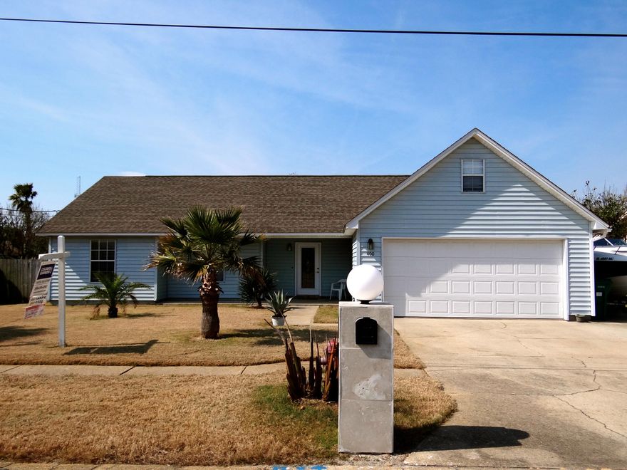 Updated home in the heart of Destin, VA approved location. New roof 2008, owner has installed $20k in travertine flooring is all areas except bedrooms where there is new carpet, new glass panes in 2008, new hot water heater, granite kitchen counter tops, large fenced in back yard with privacy fence, 2 car garage with major stand up access storage space and extra poured parking pad for boat, extra vehicle, all duct work for a/c redone - this home will not last long!!! A must see!!!! Seller has existing survey and wind mit on file, seller currently pays $1600 for annual property insurance.
