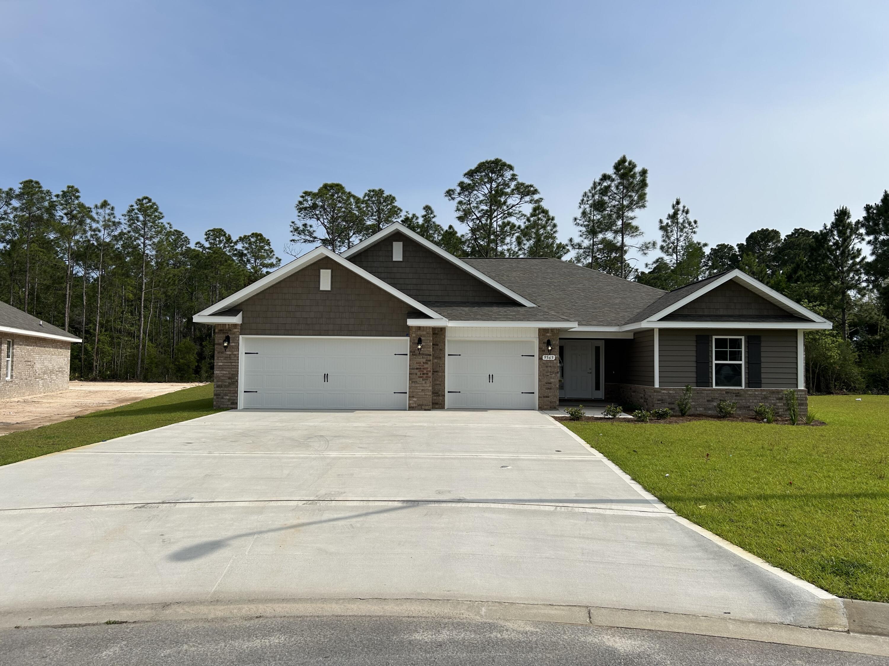 4 Bedrooms 3 Full Baths *3 CAR GARAGE * Covered Entry * Laminate flooring throughout Except Tile in Master Bath & Carpet in Bedrooms * Master Suite Features: Builder's Signature Zero Entry All Tile Walk in Shower, Separate Soaking Tub, Double Vanities & Huge Walk-in Closet *Kitchen Features: Granite Countertops, Large Island, White Shaker Style Cabinets, Stainless Steel Appliances & Walk in Pantry * Breakfast Cafe *Covered Rear Lanai * 2x6 Exterior Construction * Builder Warranty Included *