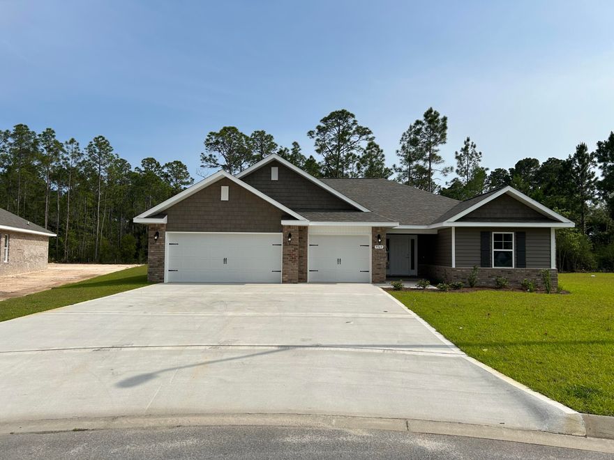 4 Bedrooms 3 Full Baths *3 CAR GARAGE * Covered Entry * Laminate flooring throughout Except Tile in Master Bath & Carpet in Bedrooms * Master Suite Features: Builder's Signature Zero Entry All Tile Walk in Shower, Separate Soaking Tub, Double Vanities & Huge Walk-in Closet  *Kitchen Features:  Granite Countertops,  Large Island, White Shaker Style Cabinets, Stainless Steel Appliances & Walk in Pantry * Breakfast Cafe  *Covered Rear Lanai * 2x6 Exterior Construction * Builder Warranty Included *