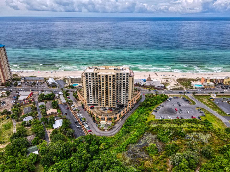 This studio unit comes beautifully furnished and has wonderful finishes. It is the perfect property for your second vacation home or investment property. Origin At Seahaven is a popular beach location as it is located within walking distance to Pier Park and Sharky's. This property has many resort amenities, such as pool, hot tub, work out room and theatre. Enjoy breathtaking Gulf views from the common areas including the sunset and pool deck! This unit is being sold furnished. Amenities include a spectacular pool terrace, BBQ and picnic areas, fitness room, sauna, and observation decks just steps away from The World's Most Beautiful Beaches.