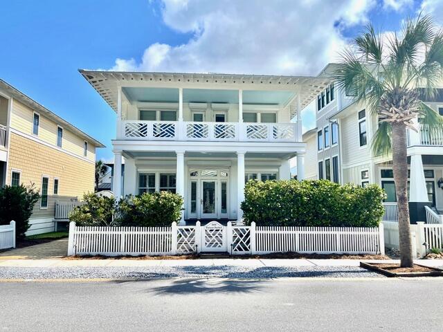''Picture Perfect'' is located in the Gulf front community of Carillon Beach. This fabulous beach home could be your ''perfect'' second home or an excellent vacation rental home. The home is currently a rental and has a good rental history. The house is across the street from one of the 8 architecturally inspired beach walkovers located in Carillon Beach. The home has double loaded front porches, two large Master Bedrooms upstairs with en suite bathrooms, a first floor guest room, an additional bunk room, full bath, living room, dining area, wet bar, and great kitchen with island. ''Picture Perfect's'' lot is large enough for a guest house.