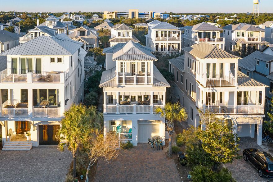 ''Seas the Day'' is appropriately named for this adorable coastal cottage in Barbery Coast. This is the perfect location, one tier off the gulf, only seven homes to the east of Rosemary Beach, and steps away from the deeded beach and community pool. It doesn't get any better or closer to walk out your door and be on the beach in 1 minute or less. This 5 bedroom/4.5 bath home offers an open concept living space for your family gatherings while making memories at the beach. The first level is home to 3 bedrooms, a laundry area, 2 full baths, 2 of the bedrooms have access to the rear porch and a path to the community pool steps away. The wide stairwell opens to the second level offering a large living/dining room with an abundance of natural light from the oversized windows lining the walls. A large balcony runs the entire width of the home where you'll enjoy evening sunsets and the gulf breeze while revisiting the fun events of the day. The second level also boasts a large bedroom with ensuite as a second master. You'll find the primary master suite encompassing the entire 3rd level with amazing gulfviews. This home has it all! Ideal for a second home or rental investment home.
