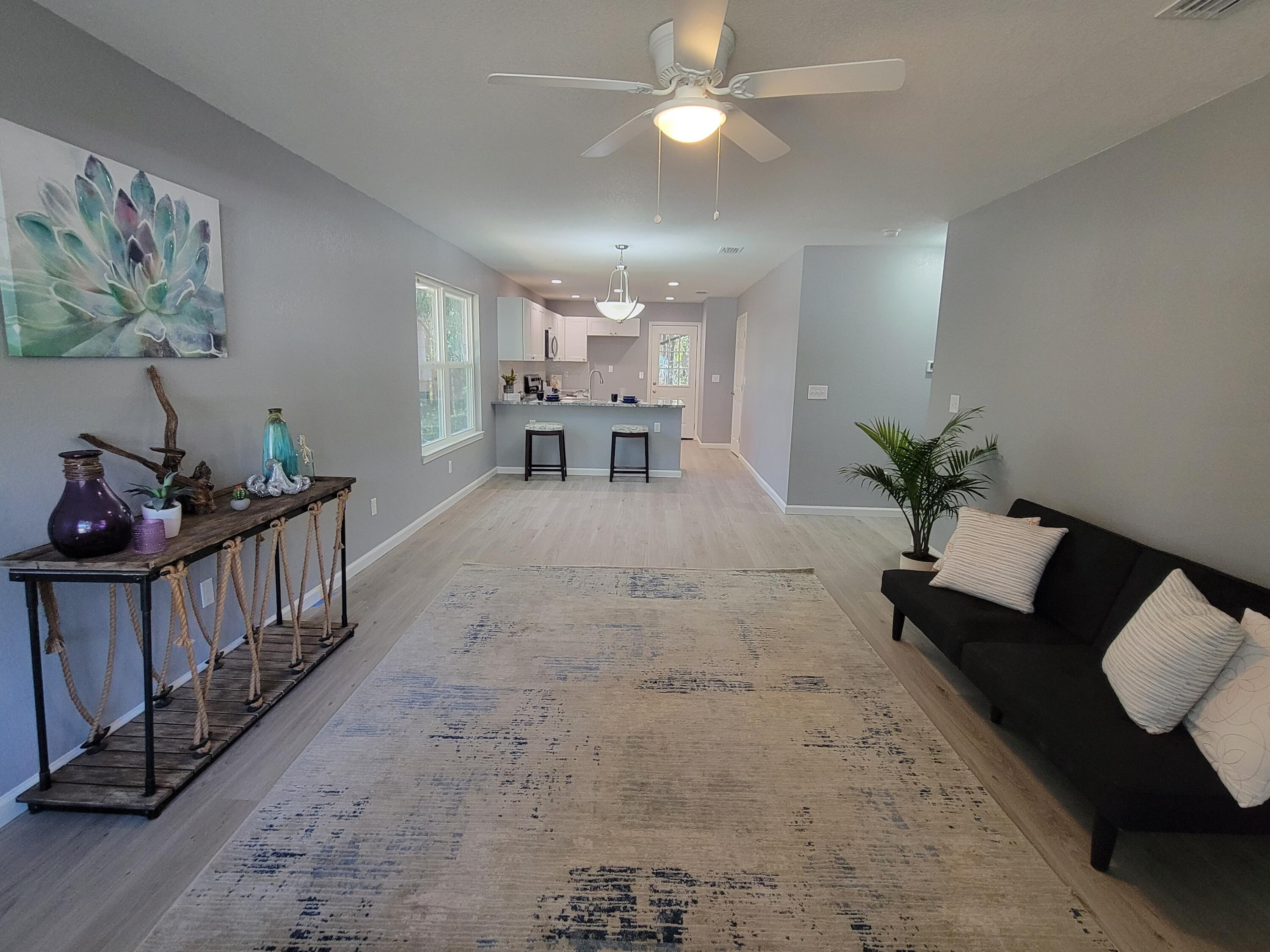 SELLER INCENTIVE OF $5,000 AND AN ADDITIONAL $3,000 WITH PREFFERED LENDER! Both can be used anyway, to include price reduction, closing costs, point buy down etc.NEW CONSTRUCTION in South Crestview.NO HOA Fees!!This is a beautiful 3 bedroom, 2 bath home ready for move-in. It features an Open floor plan with a bright kitchen and plenty of lighting. Beautiful granite countertops with a sit-down bar area for great entertaining. Stunning, White, Easy close cabinets give you plenty of storage throughout the kitchen. Plus, the VERY large walk-in pantry gives you plenty of storage and organization for all of your kitchen supplies and food. New stainless-steel appliances include a flat-top range, dishwasher and built-in microwave.
