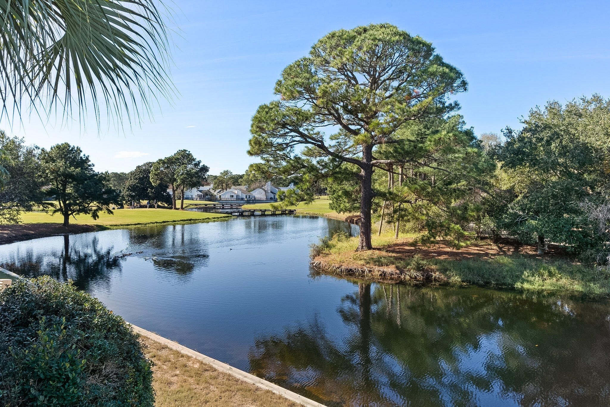 Sandestin Golf and Beach Resort features more than seven miles of beaches and pristine bay front, four championship golf courses, 15 world-class tennis courts, a 226-slip marina, a fitness center, spa and celebrity chef dining. Shop, dine and play at the charming pedestrian village, The Village of Baytowne Wharf and more. Inside the gates of the resort, residents enjoy a balanced lifestyle of high-class living, spanning the 2,400 acres from the beach to the bay. Everything within the gates of the resort is accessible by golf cart or bicycle. The entire resort is interconnected by miles of pedestrian, bike and golf cart paths that weave through groves of live oaks, meandering past natural lagoons, fountains, man-made lakes, and meticulously landscaped fairways.