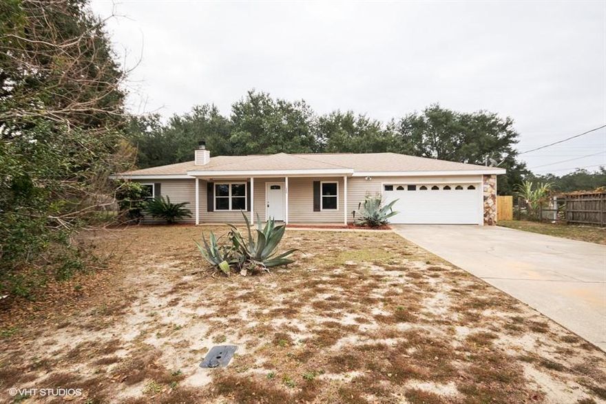 MOVE IN READY! Seller has renovated most of this home! FRESHLY PAINTED, NEW CARPET, NEW KITCHEN CABINETS, NEW APPLIANCES, NEW COUNTER TOPS, NEW BATHROOM VANITIES, NEW HVAC and More! Close to Hurlburt AFB, Shopping, and Navarre Beach. One story vinyl sided home with split bedroom floor plan. 3 bedrooms and 2 full bathrooms. Large master bedroom and bath with shower, and walk-in closet. Spacious kitchen comes with plenty of cabinets and pantry,. There's a formal dining room and a spacious living area with fireplace. Laundry room and extra room that could be an office or exercise room. 2 car garage and fenced yard on a large lot! Call for more details!