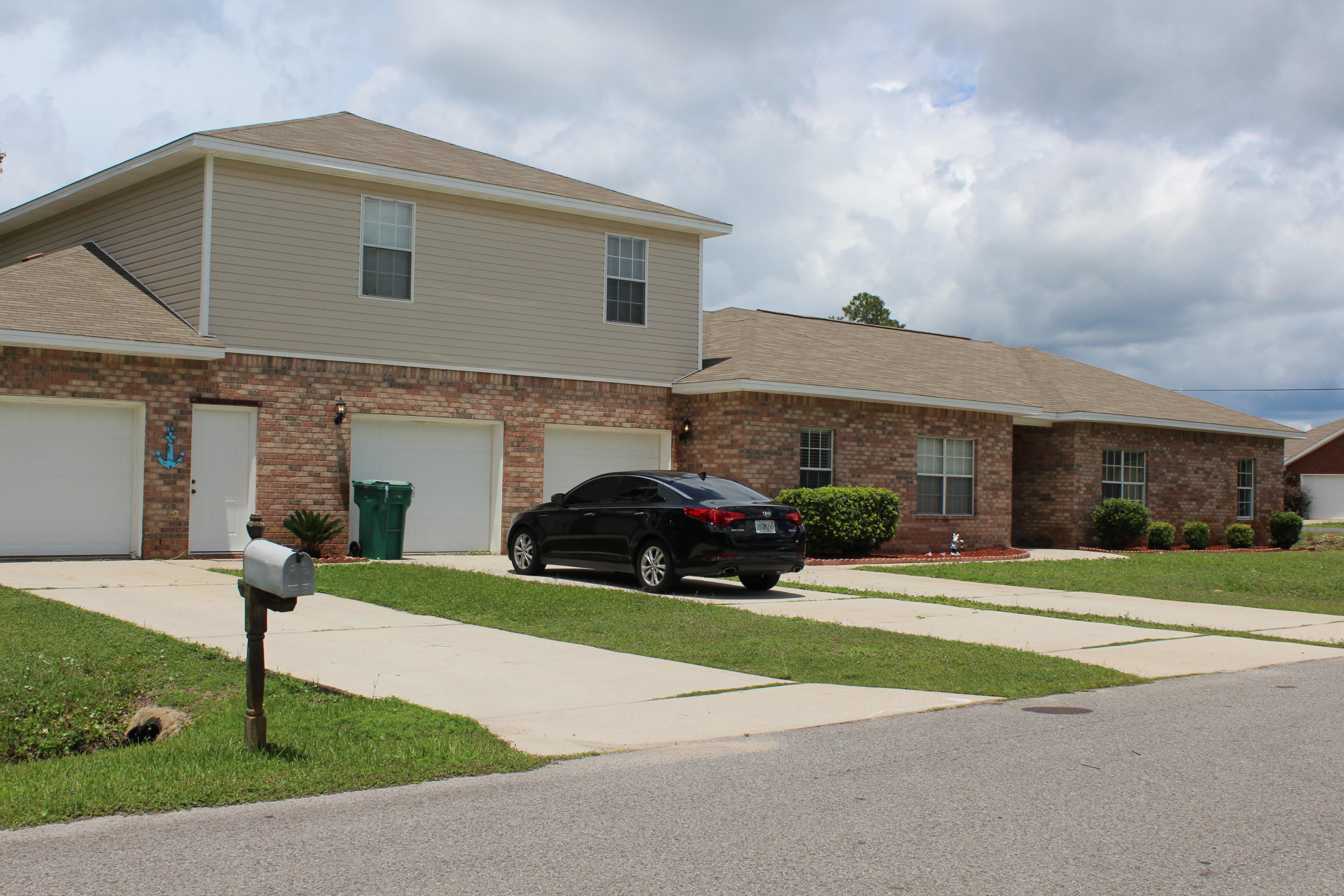 GORGEOUS BRICK HOME HAS LOTS OF LIVING SPACE AND AN ADDITIONAL SUITE ON THE 2ND FLOOR COMPLETE WITH IT'S OWN ENTRY, KITCHEN , GARAGE AND WASHER/DRYER HOOKUP (PERFECT FOR USE AS AN IN-LAW SUITE, AN ADULT CHILD LIVING AT HOME). GENEROUS SIZED ROOMS THROUGHOUT. HUGE GREAT ROOM. VERY NICE KITCHEN WITH PANTRY, BREAKFAST BAR AND BREAKFAST NOOK. FORMAL DINING ROOM IS ACCENTUATED BY ELEGANT COLUMNS. LAUNDRY ROOM IS VERY LARGE & HAS BUILT-IN CABINETS. MASTER SUITE FEATURES A LARGE WALK-IN CLOSET. 3-CAR GARAGE. Upstairs apartment has been rented to military couples that could offset the mortgage payment.
