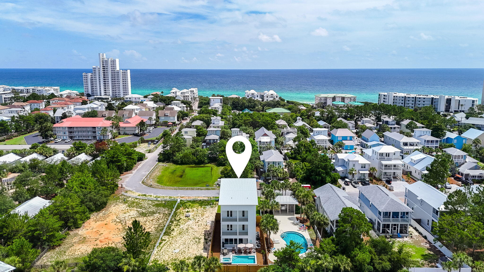 This exceptional beach house is meticulously designed to ensure the ultimate 30A beach vacation experience. This newly constructed, fully equipped coastal retreat perfectly combines comfort, convenience, and spacious coastal living. Encompassing four exquisitely appointed levels, including three floors of luxurious living space and a breathtaking rooftop terrace, it offers a truly unparalleled experience. Just 0.25 miles from One Seagrove Beach Access, the home is conveniently located near a new beach access point with restrooms and golf cart parking, only 500 yards from your door. This new access is expected to be ready by September 2025.The low-maintenance landscape design and smart features are sure to impress, built for longevity and durability from the limestone tile floors on the lower level to the brick-paved pool patio, outdoor shower and restroom, and even a covered entertainment area. This setup is ideal for an out-of-state investor seeking a second home that is perfect for both primary living and luxurious short-term vacation rentals. The home is equipped with a surround sound system throughout, and an elevator ensures easy access to all levels, catering to all ages and maximizing income potential while offering the ease and relaxation that a true beach property deserves. Nearly every bedroom is a private suite featuring elegant floor-to-ceiling tiled showers, king-size beds, and high ceilings that create a bright, open atmosphere as well as multiple covered viewing balconies pairing perfectly with a cold drink. Additionally, there is ample parking for up to six vehicles or more, a large bike rack, and even room for a golf cart!
Located in a prime Seagrove Beach location, this home offers quick bike access to the famed 30A pathways dotted with restaurants, shops, and entertainment and nearby Seaside & WaterColor. The private backyard oasis features an 18 x 11.5-foot heated pool and a 6 x 6-foot spa with a relaxing waterfall feature, including expertly placed downlighting illuminating all pathways and pool surround creating a soft, ambient glow. The backyard is fenced for privacy and is equipped with outdoor speakers and TV, ensuring you never miss the game! With five spacious bedrooms and a massive eight-bed bunk room entertainment zone, the home accommodates large groups comfortably without compromise.
The first floor features an open concept living, kitchen, and dining area designed for relaxation and entertainment, just off the pool terrace. Shiplap adorns the entire living space and adds a warm and inviting touch throughout. The chef-style kitchen boasts a stainless Thor gas range with vented hood and pot filler, a Thor dishwasher, Sharp microwave built into the kitchen island, and a high capacity professional-grade Frigidaire Even Temp built-in refrigerator! The dining table seats eight, with four additional seats along the bar front along the kitchen island. This level also includes a king bedroom with an en suite bath featuring a walk-in glass shower, a stylish half-bath for guests, elevator access to all levels, and a covered patio with a private pool, spa, outdoor shower and exterior bathroom.
The second floor boasts a south-facing bedroom suite with a king bed and an en-suite bath, offering quick access to a 15x8 covered balcony perfect for enjoying your morning coffee. All upper-level bedrooms and hallways feature elegant and durable natural oak wood composite flooring, known for its spill-resistant qualities and luxurious matte finish. Each bedroom is equipped with a flat-screen TV for added convenience and entertainment. Additionally, the second level includes two more king suites. One of these suites features a walk-in closet and shares a rear covered balcony overlooking the pool terrace. The well-appointed laundry room on this floor includes two sets of GE Steam washers and GE Sensor Dry dryers, both energy star-rated, making it easy to get ready quickly. The laundry room also features a built-in sink, ample storage, and a dedicated folding area for extra convenience. Large barn doors stylishly conceal the laundry equipment when not in use.
The third floor includes an expansive master bedroom with a king bed, spa-like en suite with soaking tub and skylight, a linen closet and a large walk-in closet. The impressive 26.5 x 16-foot bunk room offers an eight-bed built-in bunk area that is any kids dream! There's a triple vanity bathroom with a strikingly large glass shower, a walk-in closet, a 74inch flat-screen TV, a large sofa, bar top table with bar seating, and oversized bean bag chairs. The bunk room also offers a well-placed covered rear balcony overlooking the pool terrace, making sure you don't miss out on all the fun! The 10ft ceilings offer plenty of space to relax and remote-controlled fans add luxury and comfort to the space.
The expansive rooftop terrace crowns this exceptional home with a faux grass lounge, Pollywood seating arranged campfire style around a propane fire feature, with panoramic Gulf and treetop views that sweep you off your feet! From this peaceful spot, you can hear the rustling sound of the waves settling along the seashore. There's also a surprise bonus flex space room featuring 318 sqft set up for video gaming and it even comes with a poker table for added guest entertainment.
This home comes fully furnished, turnkey, and rental-ready, with no HOA restrictions, a one-year builder's warranty, and thoughtfully curated decor perfectly styled for the ultimate coastal retreat. Just minutes from Seaside, WaterColor, and local dining and shopping, this is 30A living at its best.