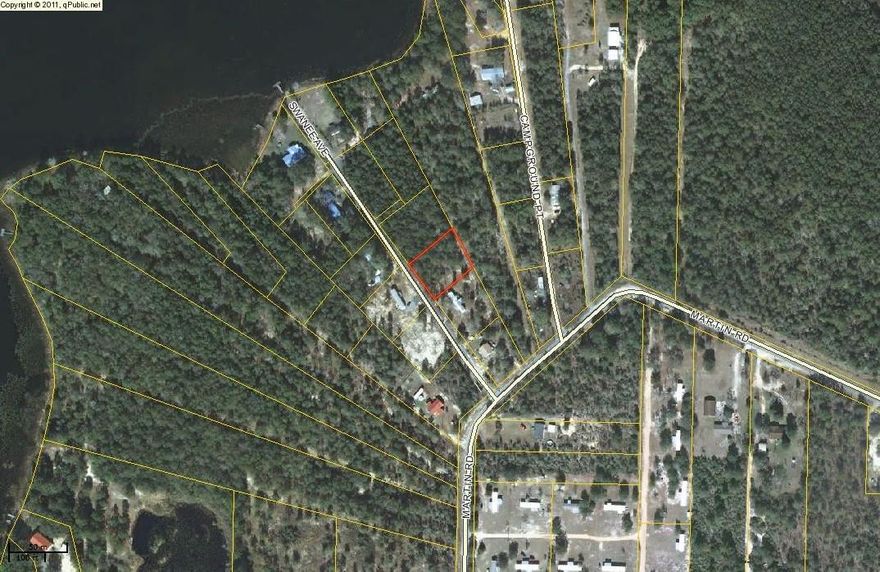 1/2 acre lot with access to Lake Holley and apx. 500 feet to community dock and boat launch for Holley Family Property landowners. This is a beautiful area of Lake Holley and would be a great home site. Adjoining 1/2 acre lot also available (see MLS #604620). Lake Holley is well know for it's great fishing (bass, breem & catfish). This would be a great place to build your dream home or vacation home. Mobile homes allowed. Public water is available on this street. Septic tank would be required.