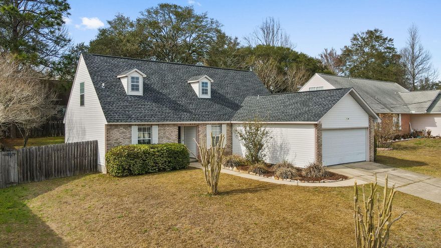 Revel in the charm and comfort of 107 Trenton Avenue, nestled in the heart of Crestview, FL. This spacious 1,799 sq ft home offers a harmonious blend of style and functionality, perfect for those seeking a serene retreat. With four generously sized bedrooms and three full baths, this residence promises ample space for relaxation and rejuvenation. The open floor plan seamlessly connects the living areas, fostering an inviting atmosphere for both entertaining and everyday living. Sunlight pours in through large windows, illuminating every corner of this delightful home. Each room has been thoughtfully designed to cater to your lifestyle, making it an ideal canvas for your personal touches.