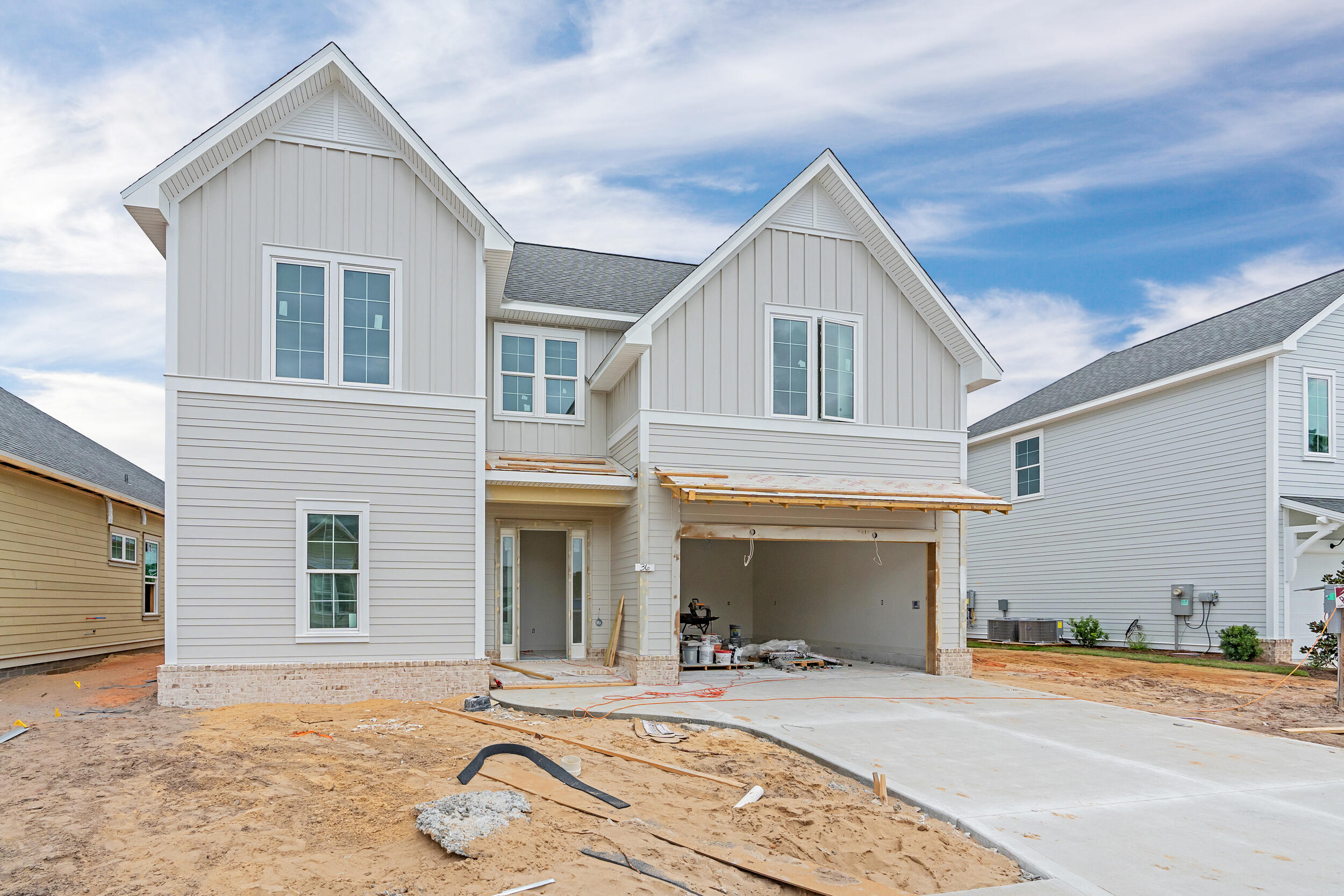 New 5 bedroom floor plan in the Longleaf Park neighborhood of the Watersound Origins community. *Ask about Featured Home incentive*  The new Macy plan by Huff Homes is 2-story with 5 bedrooms, 3.5 bathrooms and a 2-car garage. This spec home is situated on an ideal home site offering a peaceful waterview and expected to be complete Feb. 25.The splendor begins as soon as you pull into the driveway beaming with curb appeal you can't miss! Upon entering into the Foyer from the Heirloom brick front porch, you're greeted with 10' ceilings and 8' raised panel doors. Just off the foyer and separate from the rest of the living areas, the Owner's Suite embodies a retreat for rest and relaxation, along with an en suite Bathroom hosting dual vanities, private water closet and a spacious walk-in closet. The Kitchen, Dining and main Living area is the ideal lay out boasting with plenty of natural light. The double doors just off the kitchen leading to the rear screened porch with a water view, is the perfect way to start and end your day.

The upstairs hosts 4 Bedrooms, each with walk-in closets, 2 Shared Bathrooms with dual vanities and a Sitting Room that would make a perfect gathering spot.

The luxury features and upgrades in this home include: 10' ceilings on the first floor and 9' on the second, 8' raised panel interior doors, luxury vinyl plank flooring throughout, quartz kitchen and bathroom countertops, stainless steel Bosch appliances with the upgraded gas package to include dual fuel range and tankless water heater, exhaust vent hood, and a microwave drawer conveniently located in the island, under cabinet lighting, melamine closet shelving, cabinets in laundry room, gas stub for outdoor grilling, plus more!

Longleaf Park conveniently located closer to the front of the community with easy access to the Watersound Town Center with the largest Publix in the area, delicious restaurants, healthcare facilities, and more right at the entrance to the neighborhood!

The Watersound Origins community is one of South Walton's most coveted neighborhoods for its exceptional amenities, beautiful new homes, and prime location. Amenities include the Village Commons pool & fitness center, sports courts including tennis and pickle ball, miles of nature trails, unlimited golf, and lots of green space for outdoor play.

*Pricing may not include all options or fees and is subject to change. 