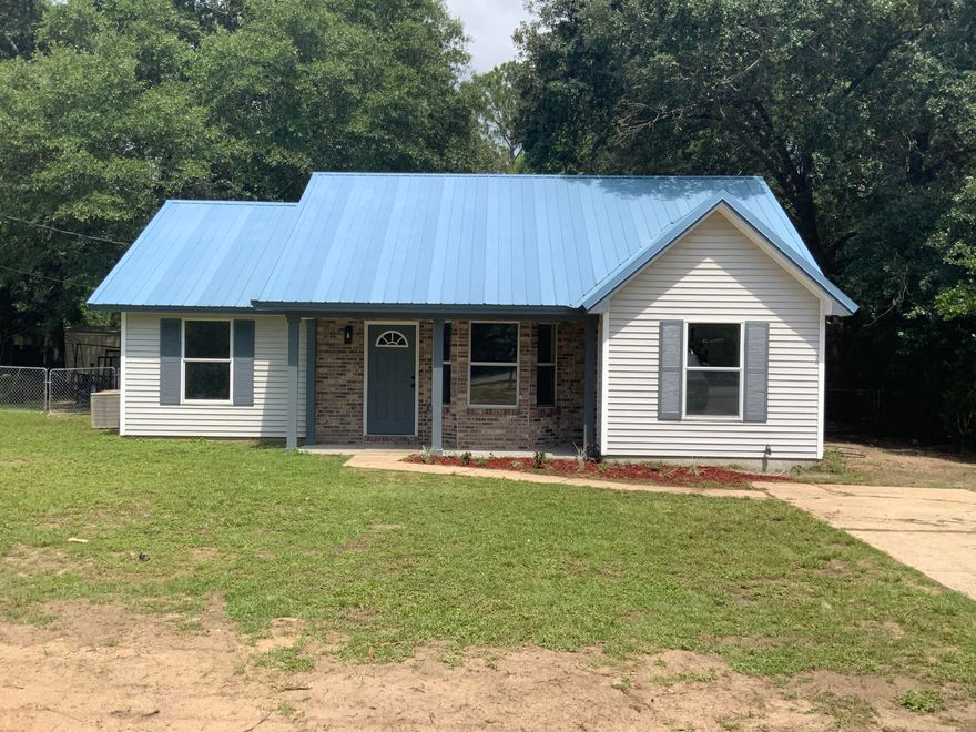 RENOVATED & MOVE IN READY HOME.  This 3-bedroom 2 bath home features new LVP flooring & carpet, paint, smooth ceilings.  Kitchen feature new cabinets, countertops, stove, vent hood, dishwasher, and existing refrigerator. The shiplap siding that divides kitchen from dining area bring this home into a new modern style.  Master Bedroom has two separate area, one is 12.3x10.11 and the other is 11.6x16.8 so you can use your imagination, home office/baby nursery in the smaller area and bedroom in the larger area.  Shower valves, water heater, switches, fan and much more have also been replaced.  Metal roof. AC serviced and cleaned 2022.  Sod to be installed in back yard next week.