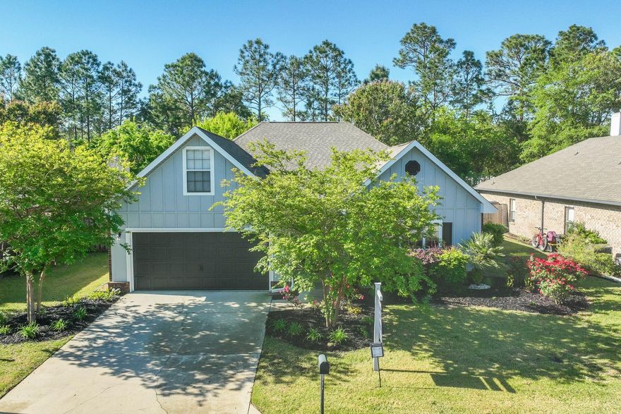 Discover serene coastal living at Whispering Lake, a short term rental-restricted neighborhood where the allure of Santa Rosa Beach meets convenience and comfort. Tucked away off Veterans Drive, this charming one-owner abode offers close proximity to beaches, shopping and dining, epitomizing the quintessential beach lifestyle. Step inside a meticulously cared-for home with a well-appointed floor plan featuring two guest bedrooms to the right of the foyer, offering privacy and functionality. The expansive living area seamlessly merges into the kitchen with a breakfast bar and dining spaces, flooded with natural light from ample windows overlooking the vast fenced backyard. Indulge in upgraded kitchen amenities, including granite countertops and stainless steel appliances, and enjoy the convenience of European-style refrigerator doors, a cold drawer, plus a bottom pull-out freezer, adding practicality to luxury. A screened back porch is ideal for starting or ending the day. A haven of relaxation awaits in the master suite, complete with a deep closet and luxurious bath featuring a shower and Garden tub. Ascend the stairs to discover a versatile bonus room above the two-car garage with a sink and storage. This space is an extra guest bedroom with a closet and window, but could also be perfect for an office, playroom or media space. Outside, the neighborhood exudes tranquility, with friendly neighbors and spacious yards ideal for pool, pets and gardens. Vaulted ceilings in the living room and elevated guest bedroom ceilings enhance the ambiance with natural light. Offered with window treatments and an unfurnished canvas, this residence awaits your personal touch.  With the closest beach access point conveniently located at Highway 393, and meticulous landscaping enhancing curb appeal, this home embodies coastal living at its finest. 