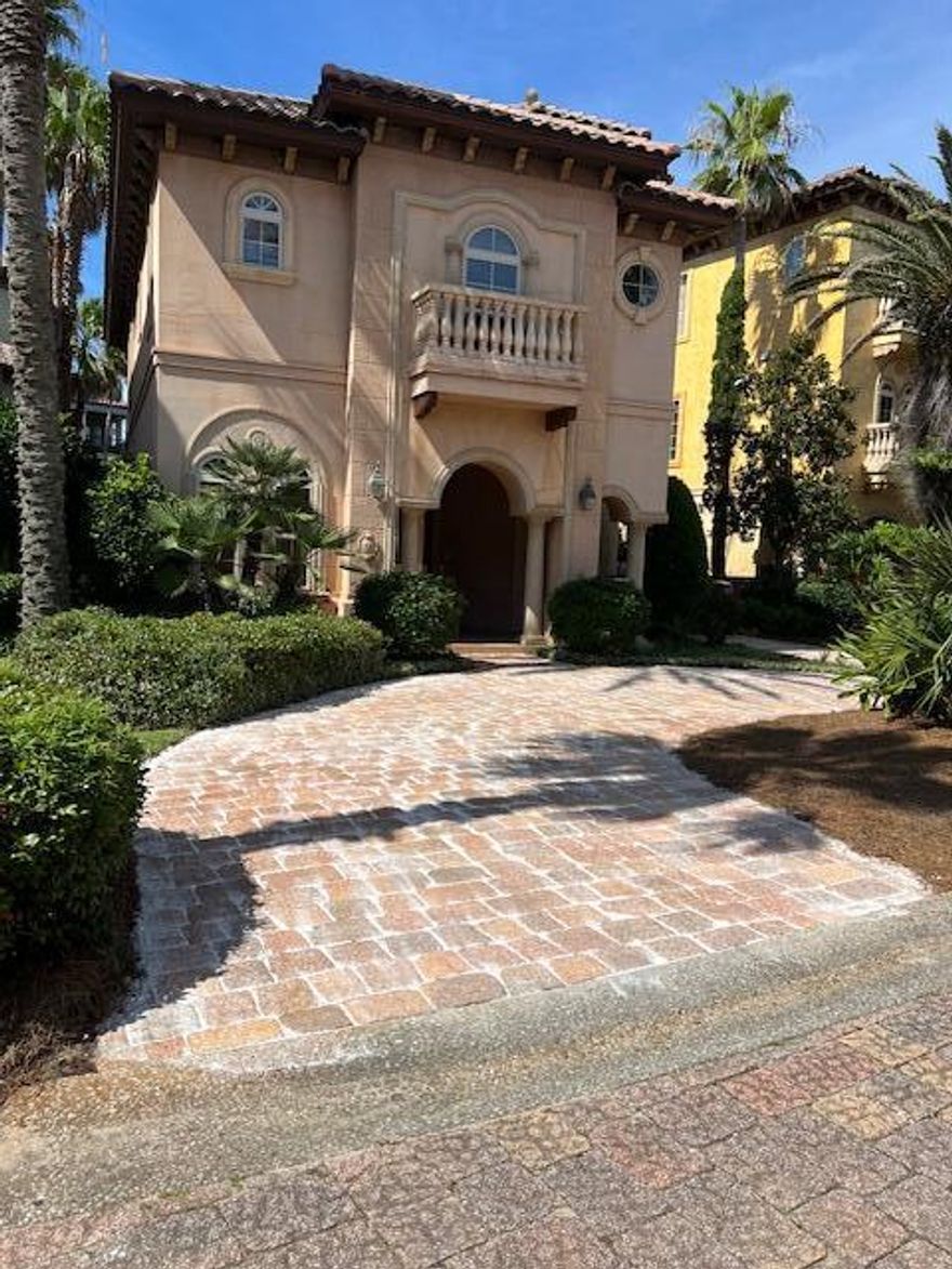 This unique Tuscan home epitomizes luxury and comfort. Located within the gated community of St. Tropez on Old Scenic Hwy. 98, the property is within walking distance of the beach, shopping, and restaurants, making it the perfect spot for a vacation or an exceptional rental investment.Upon entering the home, you will discover two bedrooms and two en-suite bathrooms on the first floor, along with a laundry room and access to a vast covered patio that offers direct access to the pool.As you ascend the stairs, you will find the primary bedroom, which features a large walk-in closet and an en-suite bathroom equipped with a separate shower and a spacious garden tub. The kitchen is open and includes granite countertops and a gas stove, providing ample space for large gatherings.