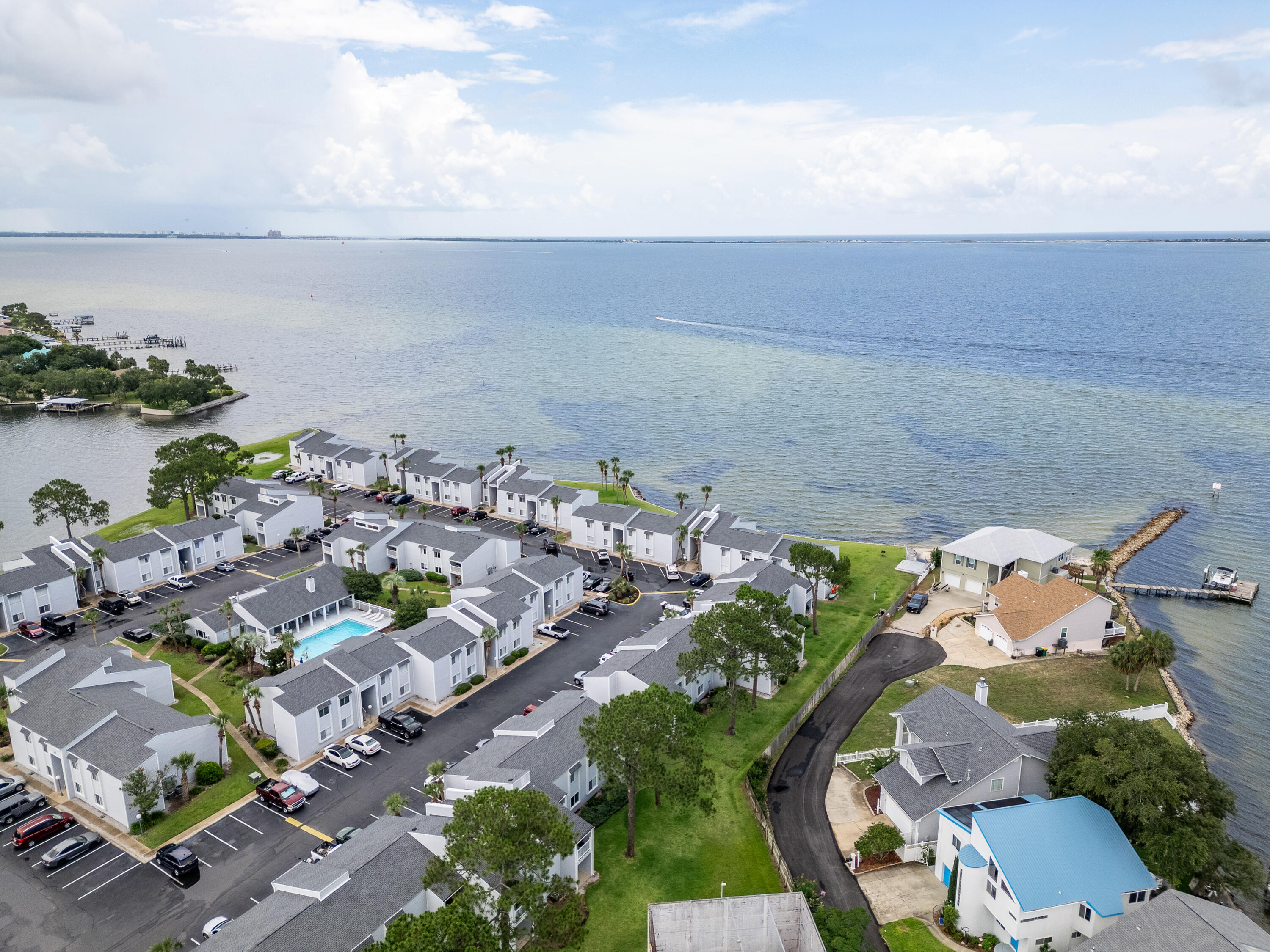 Look no further for your slice of paradise! This charming 1-bedroom, 1-bath, 680 sq ft condo in Shalimar, FL, offers an incredible opportunity to live bayside without the hefty price tag. Built in 1974, this unit has been thoughtfully updated over the years, featuring a new water heater in 2023, a 2024 refrigerator, and a 2021 HVAC system, ensuring comfort and peace of mind.Step inside and find a furnished retreat with stunning water views from your private balcony and dining area - perfect for enjoying your morning coffee or an evening sunset.This private, gated community is packed with amenities designed for an active waterfront lifestyle. You'll have access to laundry facilities, a community mailbox, a refreshing pool with poolside restrooms, a community room, and even a vehicle washing areas. Pet owners will appreciate the designated pet walking areas. Spend your days on the community beach, soaking up the sun on the sundeck, or enjoying a meal at the BBQ area. For the adventurous, the bay offers endless opportunities for fishing, paddleboarding, kayaking, sailing, and crabbing. Stay active with on-site tennis and pickleball courts.
Conveniently located, this community is just minutes from Eglin Air Force Base and the Destin-Fort Walton Beach Airport. Don't miss your chance to experience bayfront living at its finest!