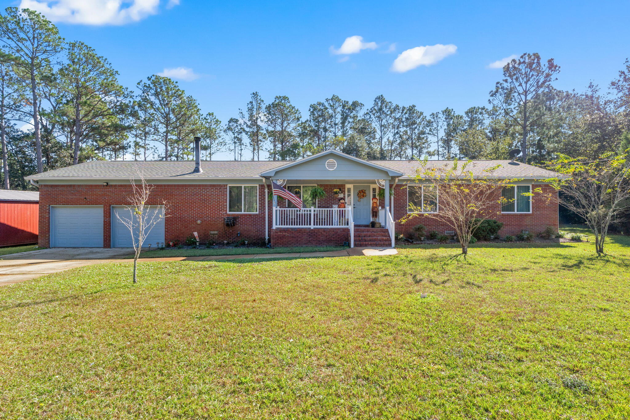 Check out this charming 3-bedroom, 2-bath home on just over an acre in East Navarre. Enjoy peace of mind with hurricane impact windows, a whole-house water filtration system, and solar panels paid off at closing! The kitchen features granite countertops, a deep sink, and newer appliances. Luxury Vinyl Plank (LVP) flooring flows throughout, adding durability and style. Step outside to your private backyard featuring a large deck, above-ground pool, and a new shed. Relax in the covered and screened back porch that gives you year-round comfort and enjoyment. With seamless gutters, plenty of space to park an RV, and a sprawling yard, this property is as functional as it is beautiful. Rare combination of being close to both beaches and bases while still giving you room for privacy and space, homes like this do not come along often so make your appointment today!
