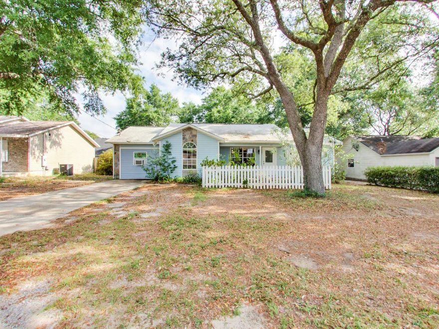 Reduced to sell! Please show! Awesome location, south of I-10, cozy 3 bedroom, 2 bath home. Home comes with a mounted 48 inch, Sony Smart Television. Open floor plan with split bedroom for privacy. Garage has been converted to a spacious bonus room that is cooled by a window AC unit. Cathedral ceiling in the living room and dining area. Master bedroom has cathedral ceiling and a walk in closet in the master bathroom. The family room has sliding glass doors that open up to a large level yard with a privacy fence and a large storage building.