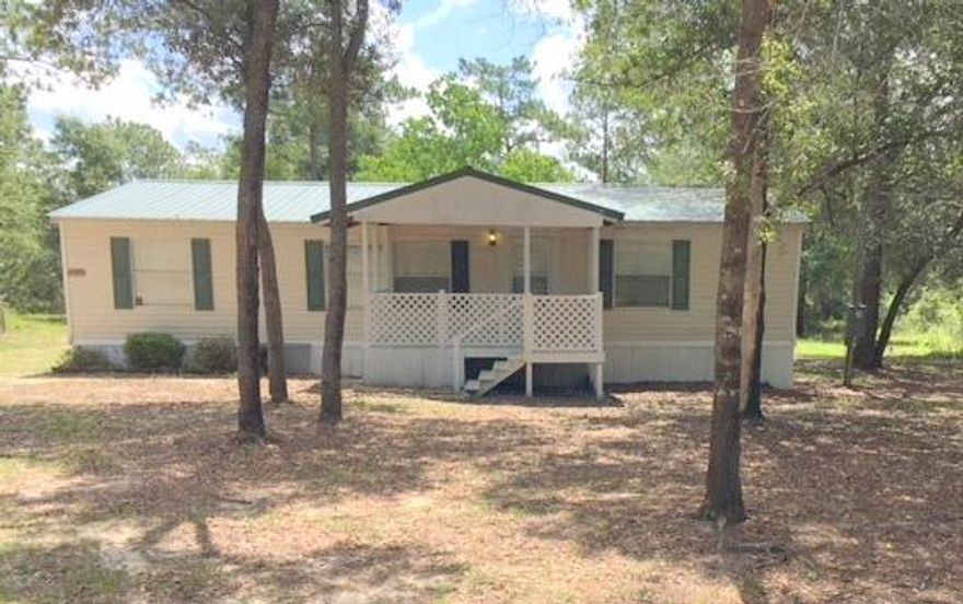 NOT a Short Sale, NOT a bank owned property. Can Close IMMEDIATELY!!! Beautiful 3 bedroom, 2 bath mobile home sitting on 1.01 acres of land in Holt FL! It has over 1400 square feet of living space with a spacious floor plan and beautiful flooring throughout. Kitchen has plenty of cabinet space for storage along with new appliances. Enjoy front or back porch that overlooking your secluded land! Centrally located just off of Log Lake Rd and I-10