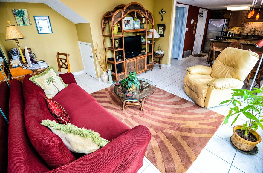 This beautiful 2nd floor Pinnacle Port Condominium has wonderful Gulf front views from the living room. The kitchen has been completely re-modeled with new granite and cabinets. This unit is but one flight up from the parking lot so the elevator is almost never needed. The condo looks across the pool gives a beautiful view of the waves washing onto the sand. The doors have all just been replaced, the trim painted and you will find this unit ready to be a full time home or an excellent rental property. There is no property in PCB that offer more in amenities than Pinnacle Port. It has the largest heated pools in the area with fishing dock, boat launching and lighted tennis courts. There are two pool and an outside children's play area as well as a cook out area. The location can't be beat.