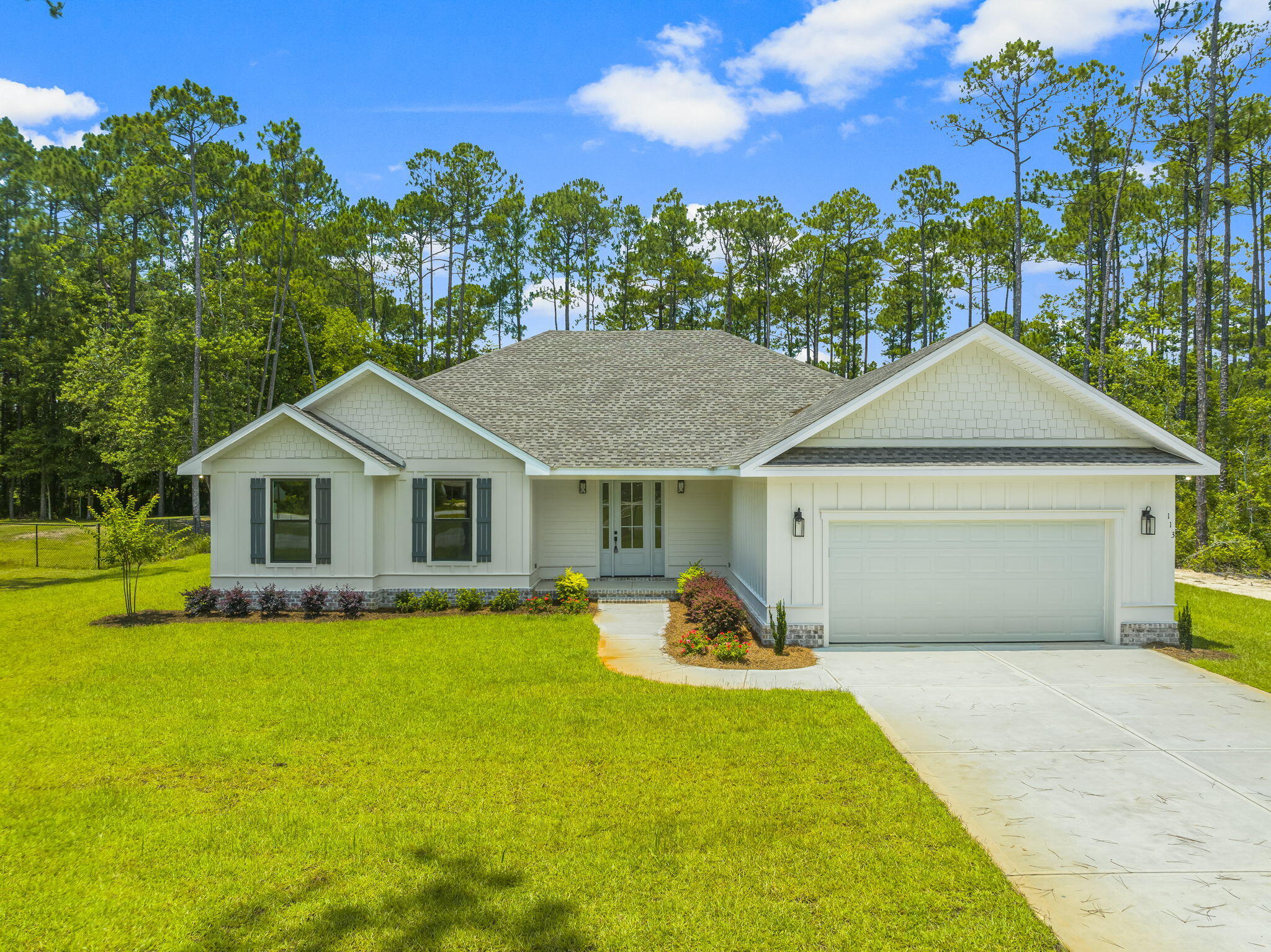 New Construction Home In Freeport FL. Will Be Completed Soon & Move In Ready. Open Floor Plan With Upscale Finishes. Grand Entry. Starting With The Kitchen That Displays A Big Island, Stainless Appliances, Granite Countertops, And Beautiful Cabinetry. Great Room with 11 ft. Ceiling Displaying Wood Design. Large Master with Tray Ceiling. Master Bath with Large Walk In Closet, Separate Shower And Bath. 1/2 Bath Featured Off Of Kitchen. 3 Additional Rooms with 1 Full Baths On Opposite Side Of Home. Plank Style Floors Throughout Home w/ Tile In Baths. Screened Porch. Lot Is Slightly Larger Than A Half Acre. Community Has No HOA. Only 20 Min Drive To Gulf & Beach Accesses. All Dimensions Are From Floor Plan. Buyer To Verify. Must See Home! Call Today To Schedule A Showing!