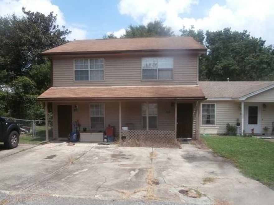 Spacious 2 Bd / 1.5 Ba Town Home is perfect for rental investment or first time home buyer. Large living room, eat in kitchen with access to the fenced back yard. Both bedrooms are situated on the 2nd floor. Don't miss out on this great opportunity.