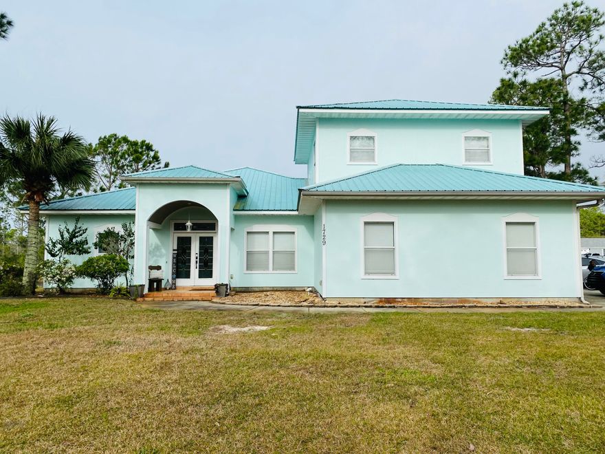 ** Pictures coming soon *** Beautiful upscale custom home located in desirable Smugglers Cove. This is the ideal home for entertaining or just relaxing in the backyard on your private dock. The kitchen features sparkling granite countertops, pub height office nook, custom cabinetry with pull-out shelves, recessed lighting, and hop-up bar. Master bedroom has French doors that open onto screened porch overlooking pond, 42-inch wainscoting & trey ceiling. Updated master bath has a Roman shower. Screened porch is plumbed for outdoor kitchen. Other features include concrete board siding (not stucco); metal roof, 2nd bath upgraded; new HVAC system 2019, sea wall built 2019, community pool, HOA private pier and deeded assess to Sound