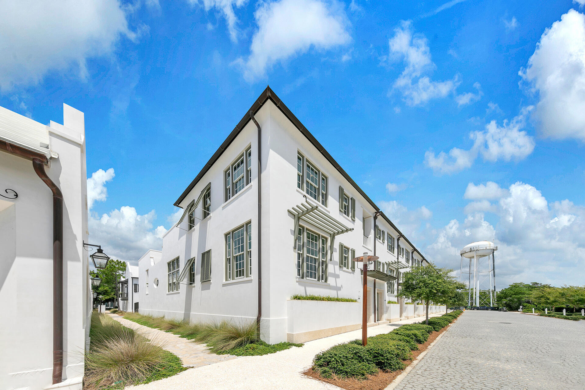 Come see and experience the beauty of this lovely corner home located in ''Claremont Courts'' residence by Renowned Khoury-Vogt Architects. Without question, this luxury modern courtyard home features 16 foot ceilings with tall windows everywhere! This home sits on a corner  lot which allows for an entire wall of windows letting in beautiful light throughout this home. Main floor with open floor plan which opens to the al fresco dining and lounging areas with gas fireplace. Back inside, the gourmet kitchen is slightly tucked away from the dining area, perfect set up for your favorite private chef dinners and large party gatherings. Primary bedroom conveniently located on the FIRST floor, 2 more bedrooms and bathrooms located upstairs. Please see the MORE tab! Your large courtyard takes you up a small flight of steps located above your oversized two car garage, to your private studio style Carriage House Casita with a summer kitchen, writing desk, and oversized beautifully appointed bathroom with a luxurious marble counter along with marble tiles in the shower. Carriage House enjoys an oversized balcony with two separate sitting areas plus an outside TV for watching all your game day plays. Don't miss seeing the beautifully adorned Venetian plaster interior walls as well.  Architectural features make this home a one of a kind amongst all the amazing homes in this exceptionally unique, breathtaking community.  The unbelievable private beachfront club is yours to enjoy as an Owner in this exclusive beach community of ALYS BEACH. Don't miss out on this one!