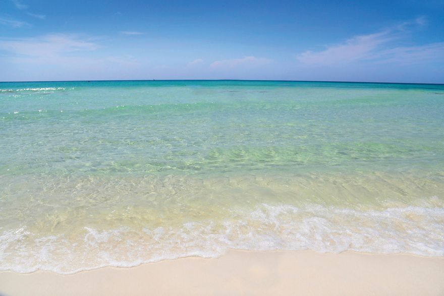 Parkside at the Henderson Beach Resort! Second floor unit with a mile and a half expansive view of the gulf of America! This luxurious 2 bedroom & 3 bath condo is perfect for the person that wants amazing sunsets views everyday! The appointments of the unit are wonderful: 10 ft. ceilings, upgraded GE Cafe' appliance package with a double oven, a double drawer dishwasher, and a high end refrigerator. Quartzite counter tops, tile thru out, wine refrigerator & a coffee bar. Two spacious bedrooms with en suite bathrooms plus an additional bunk area with its own bathroom. The open floor plan is fabulous for entertaining.  2 LG TV's, Toto toilet, & Custom draw drapery. The Henderson Beach Resort  speaks for itself! 3 large pools, Spa, 2 fitness rooms, ballrooms, meeting areas, & restaurants. Once you arrive....You will never have to leave the resort! Convenience is key! The beach is just steps away, as well as shopping , and family fun! Enjoy making memories at your new beach home! 
