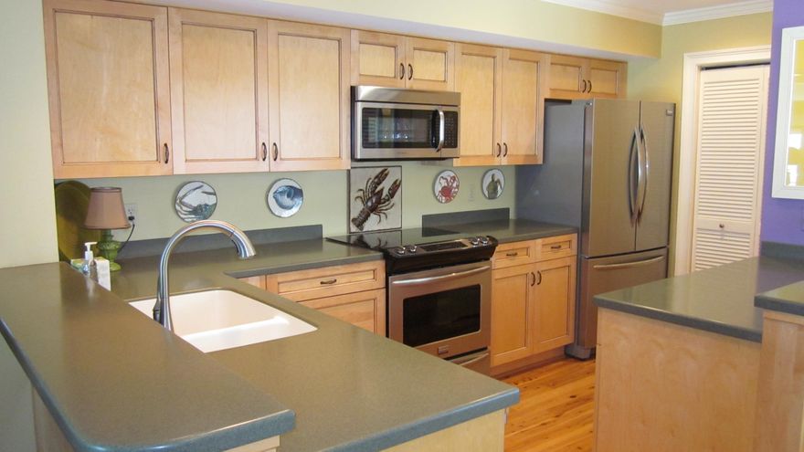 If you are looking for a totally renovated condo with a FABULOUS view then you just found it. This adorable condo is a one bedroom one bath. It has been totally updated and has great views of the links golf course, marina and bay. The condo comes completely furnished with great looking furniture and artwork.The floors are made of Australian cypress wood. The entire Harbour Point community has just had a facelift. The exterior has just been updated with the old siding being replaced with Hardy Board and all of the trim being painted. The unit has a new heating and air conditioning system, new water heater, all new high end stainless appliances,including a full size washer and dryer. There are also new light fixtures and ceiling fans. HOA dues are 545.50 monthly and SOA 361.00 quarterly.