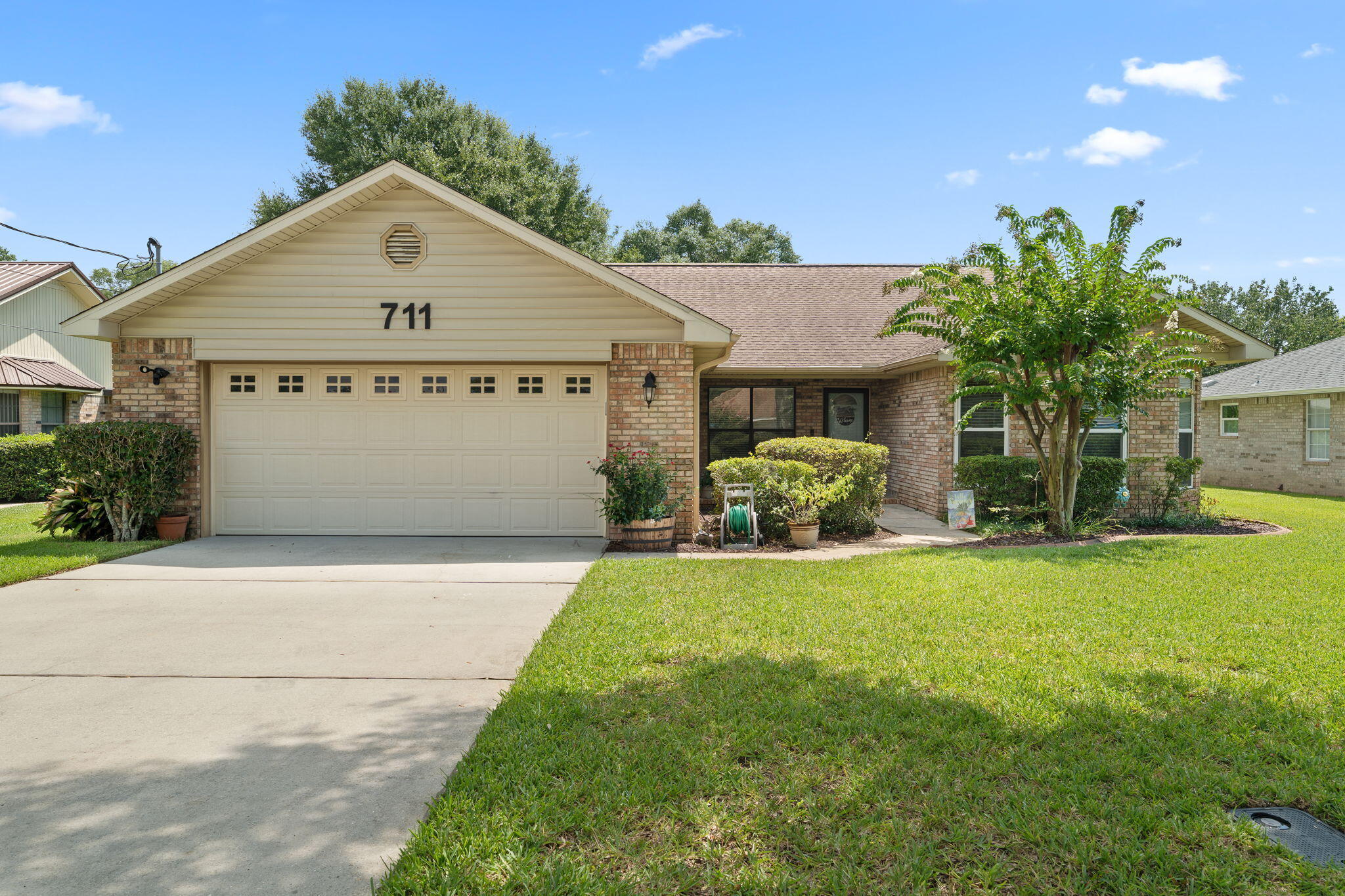 Looking for a POOL home? Look no further! ~ 3 bedrooms ~ 2 baths ~ 2 car garage (big enough to fit a boat!) ~ LVP Flooring ~ TILE flooring in bathrooms ~ Beautiful Kitchen with GRANITE Countertops, STAINLESS Appliances (Dishwasher, GAS STOVE, Built in Microwave, and Refrigerator) ~ Updated Lighting ~ GAS FIREPLACE ~ Beautifully maintained yard with SPRINKLER SYSTEM and inground POOL ~ Covered porch ~ Yard Building ~ Fenced in back yard ~ This is one you don't want to miss! Call today for your personal tour!
