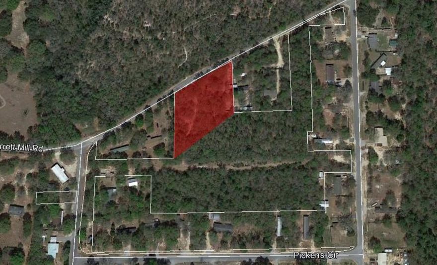Wooded lot on paved road. Perfect place to build your dream home. Property isalso zoned for mobile homes. This is 1 of 3 lots available. Property would need asurvey for exact location and dimensions.Buy one lot or other lots available.
