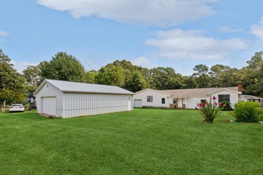 Come by and see this one of a kind property! This 4 bedroom 2 bath home has plenty of space inside and out. Located only 2 miles from Crestview High School, you will love how conveniently this property is located to shopping, work and fun! If you are a car enthusiast, a wood worker, or simply need extra space to store things, you need this 30 X 40 detatched shop in addition to the attached single car garage. The shop has two double automatic garage doors and power.  This home has been recently updated with new flooring throughout, new cabinets, new countertops, The roof is approx 2 years old.  The HVAC and hot water heater are appprox 5 years old.  In addition to the four bedrooms is a large media room that could potentially be a 5th bedroom.  Upon entry you will notice the quaint setting