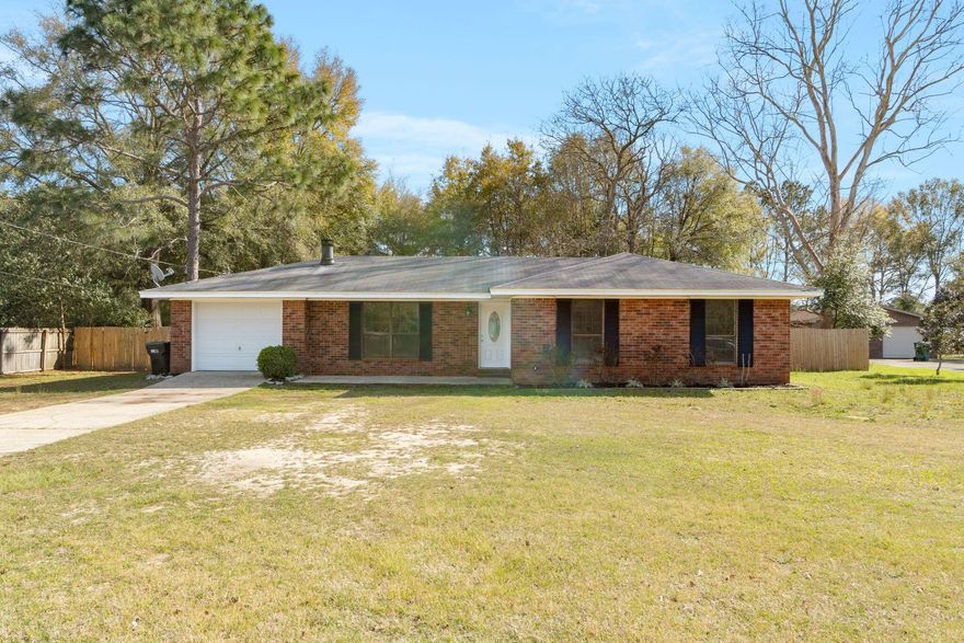 BRAND NEW ROOF will be put on before closing! Check out this lovely, renovated home on over half an acre, in Crestview! Upgrades include fresh paint throughout, new landscaping, a stunning fireplace, tile master shower, beautiful Brazilian cherry wood flooring in the main living and hallway area, tile in the wet areas, and BRAND-NEW CARPET in the bedrooms. The home has a semi-open floor plan with an eat-in kitchen. It is close to dining and shopping, but you will want to stay home and relax in the HUGE backyard and enjoy a nice bonfire in your fully fenced-in backyard. Be sure to add this to your list to see before it is gone!