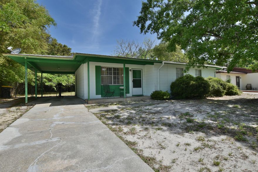 Concrete block Florida home in central Fort Walton Beach. 3 bedroom, 1 bath, convenient to the bases and the beach. Walk through the front door and you are greeted with open living room, kitchen, and dining area. Down the hall are 3 bedrooms and a bathroom. Laundry/Storage room off the kitchen and dining area. Large backyard with plenty of room.