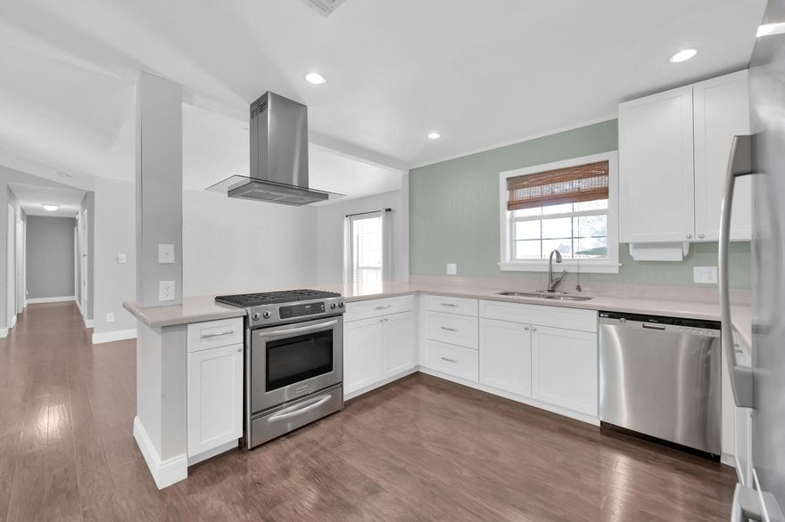 Tired of homes built on top of one another? Looking for a spacious garage? How about a pad for parking that RV?! Look no further. This spacious all brick home is vacant and ready for a new family to make it theirs.You will love the way the living space flows - ensuring no one feels excluded. The kitchen has been updated w/built-ins, SS appliances and a modern vent hood. The carpet in the bedrooms is brand new and the home's interior is freshly (neutrally) painted, providing a canvas on which you can tailor the color palette to your liking.